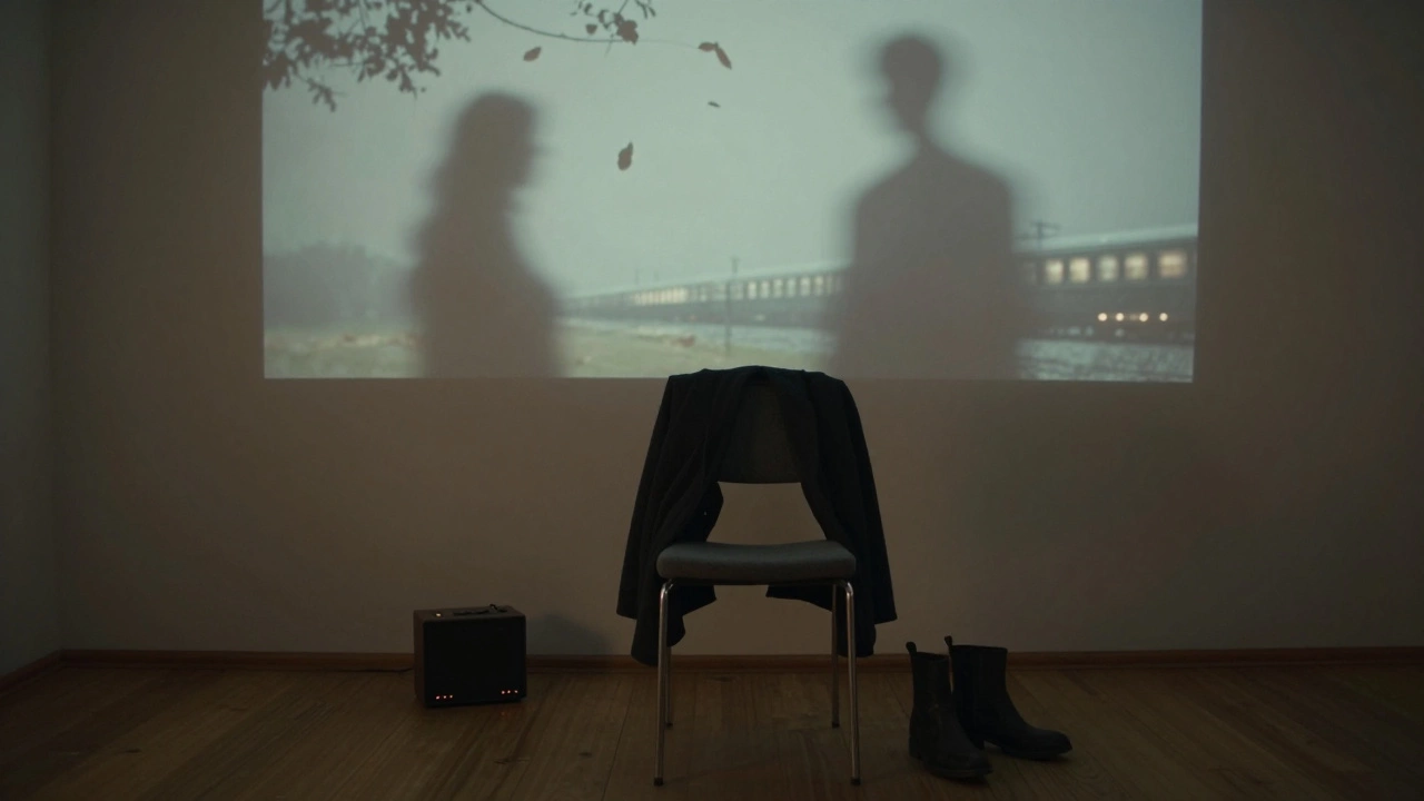 An empty chair with a coat, a softly pulsing speaker, and shadow projections of nature and motion on the wall.